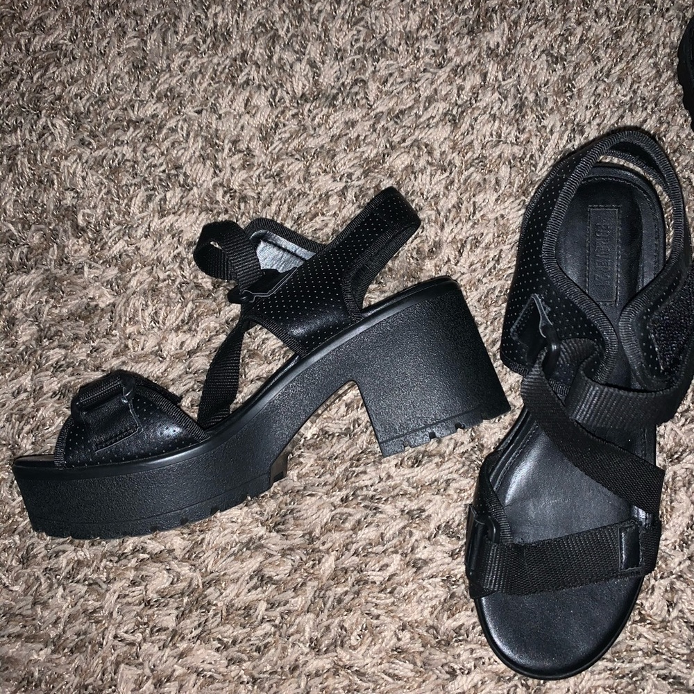 black strapped heels